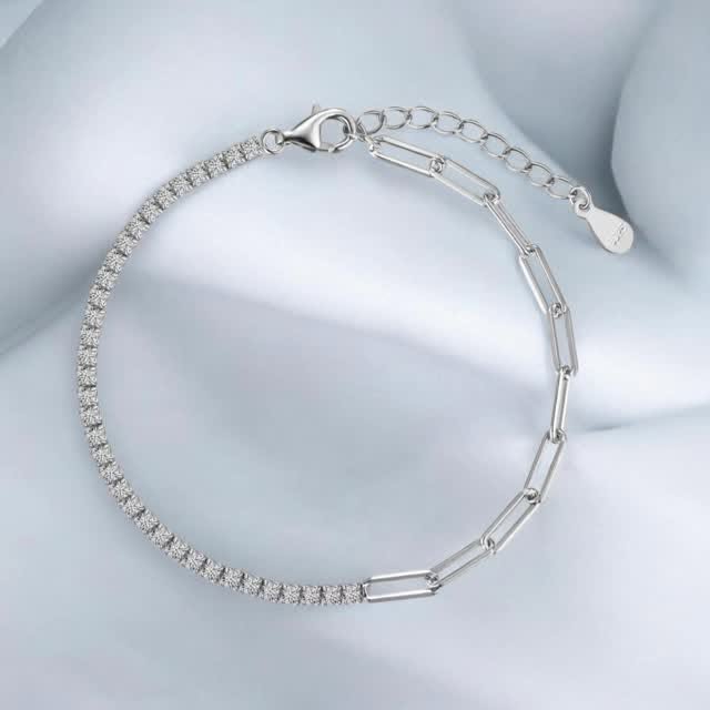 Close-up of a bracelet combining rectangular links and a line of sparkling accents